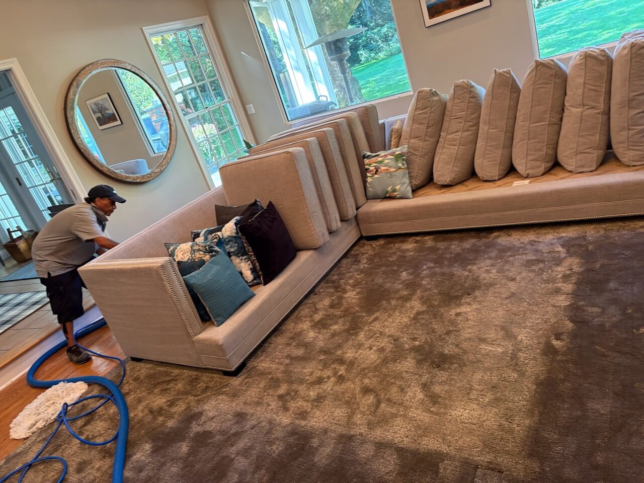 On the job, deep-cleaning upholstery
